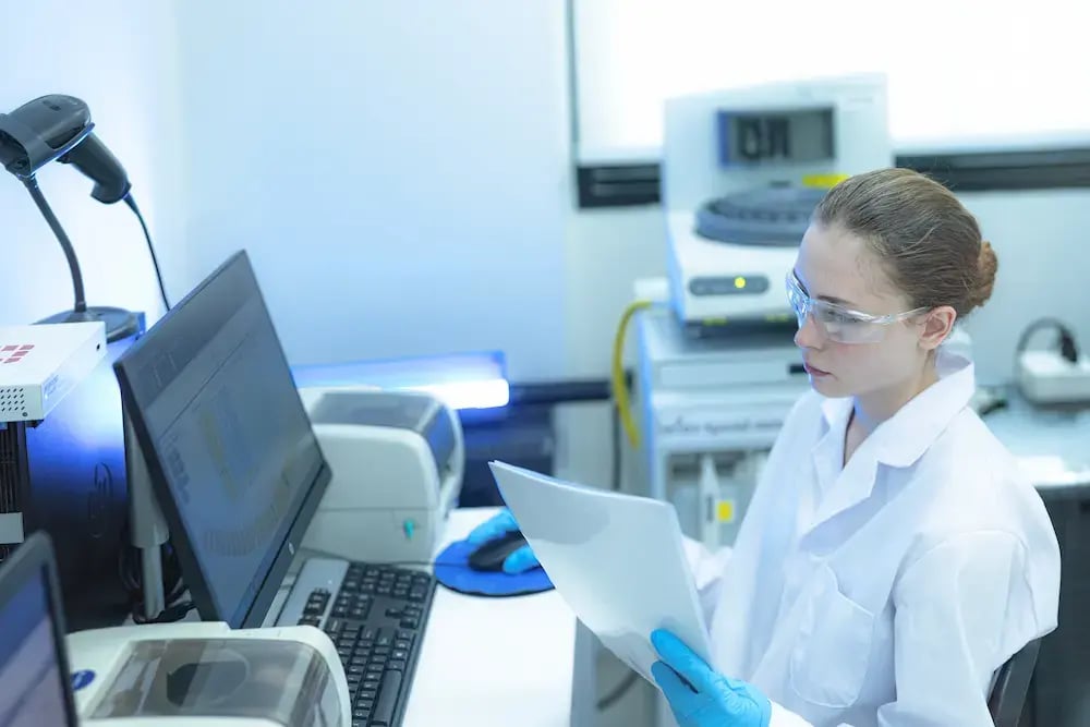 clinical specialist using a computer to input data