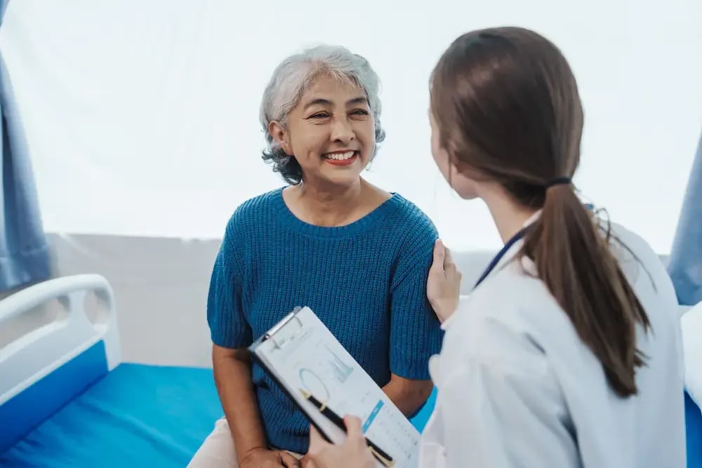 doctor helping a patient