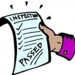clip art of hand holding paper saying inspection passed