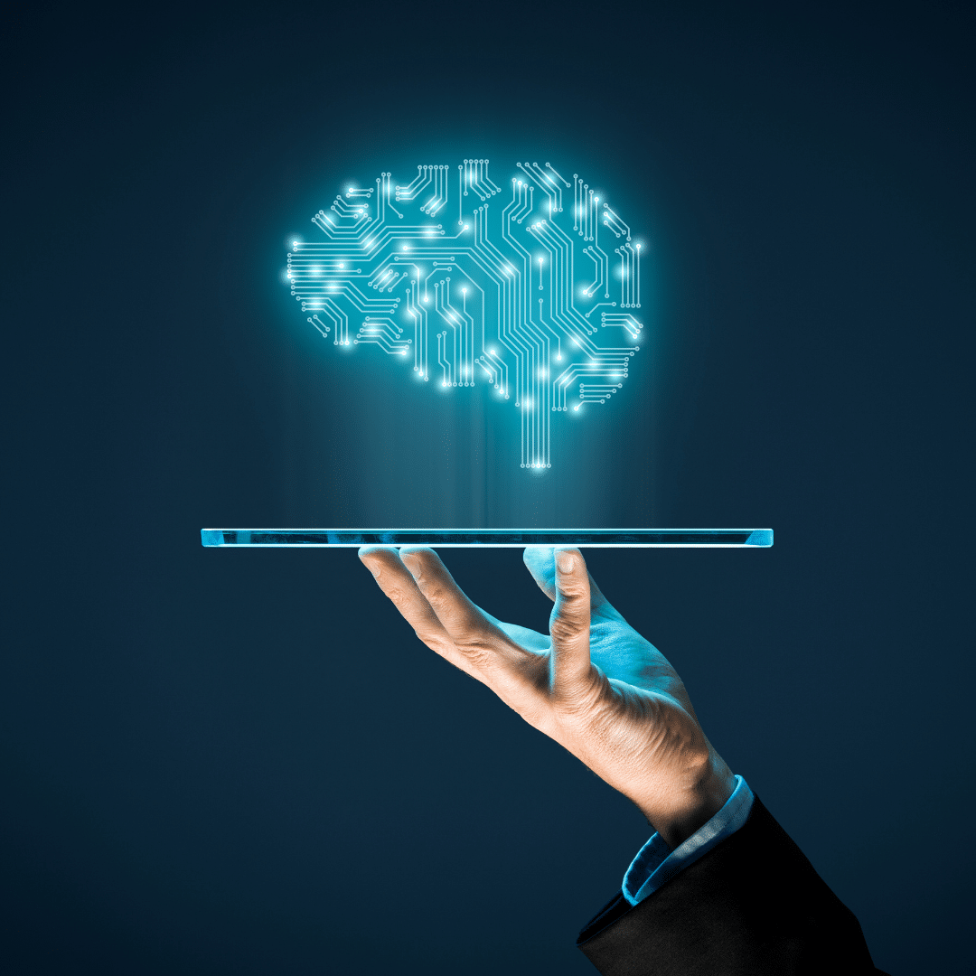 hand holding tablet with abstract brain graphic floating over top