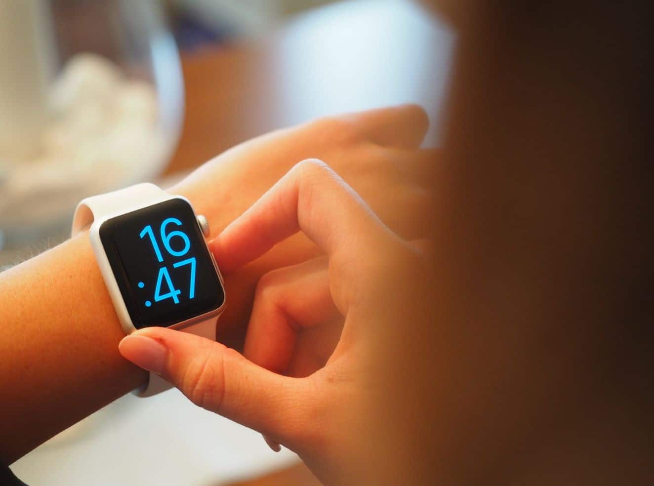 person checking smart watch