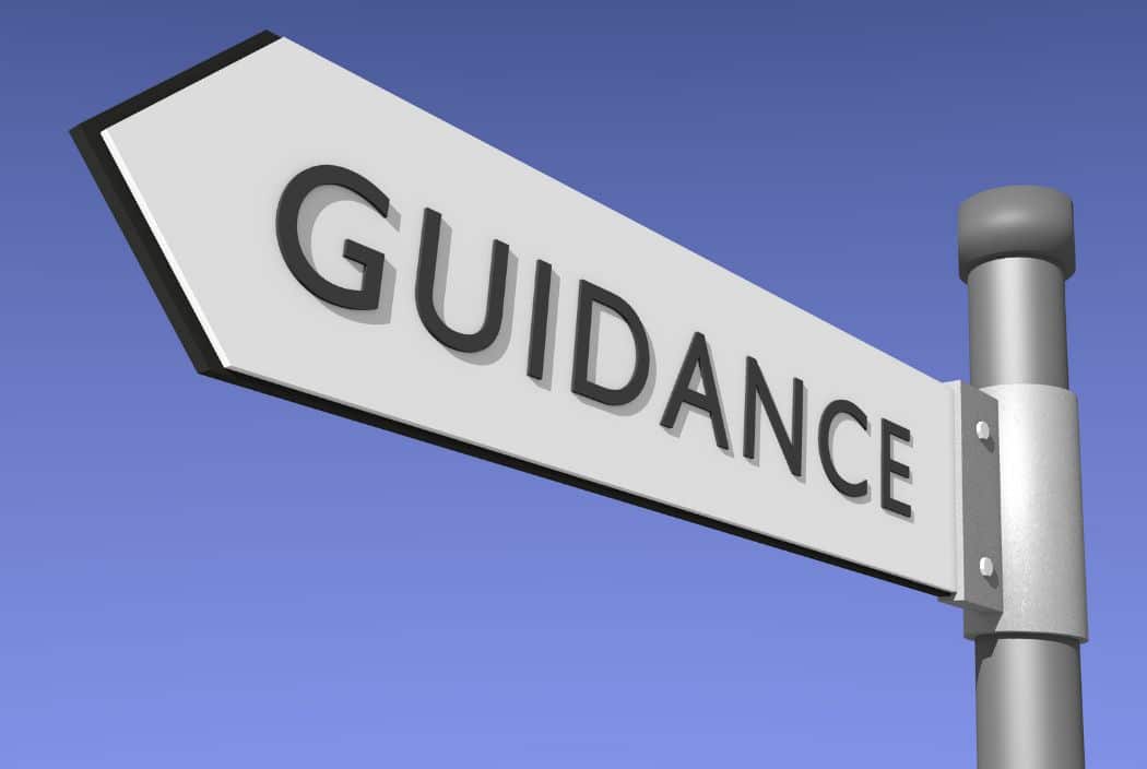 sign pointing to guidance
