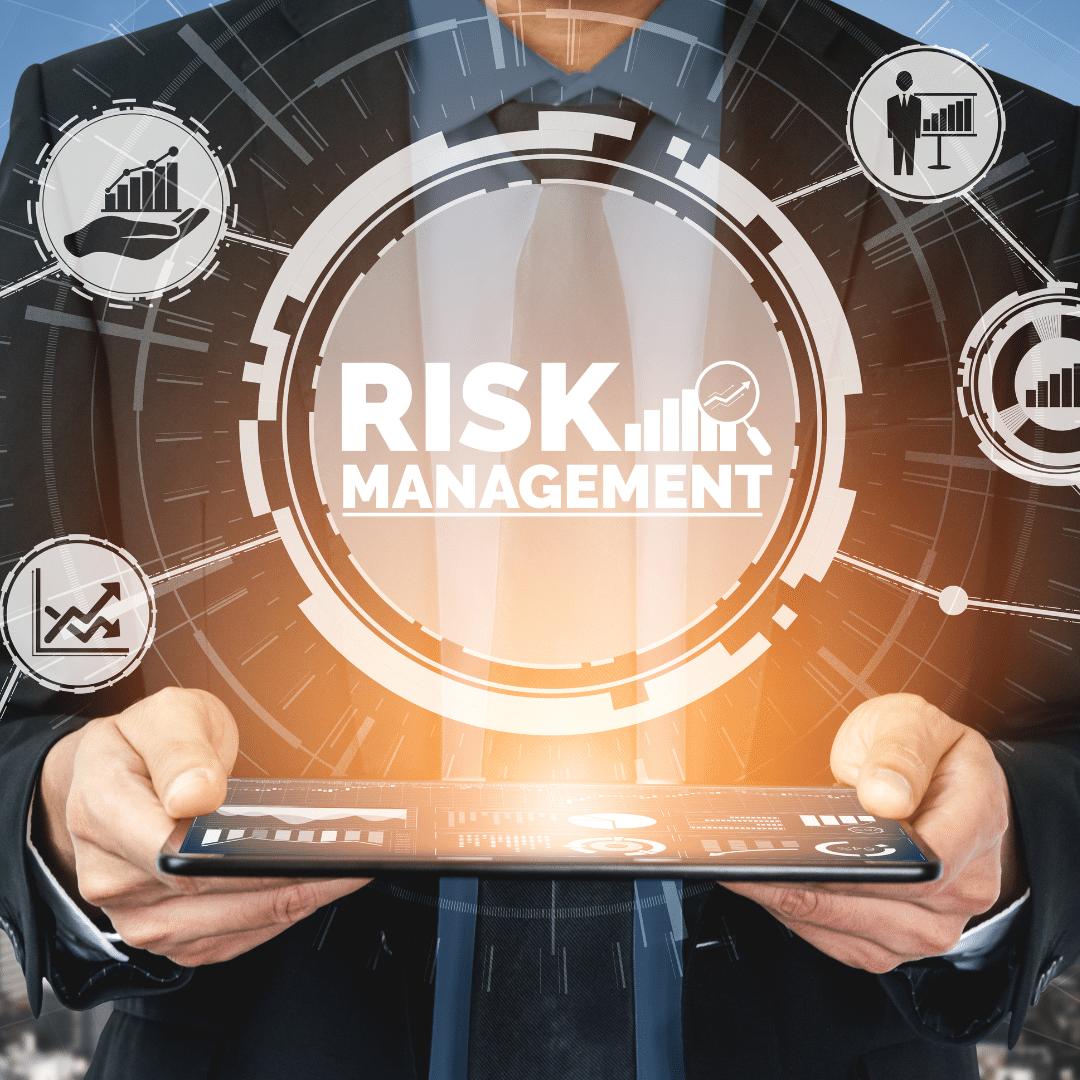 man holding tablet that says risk management