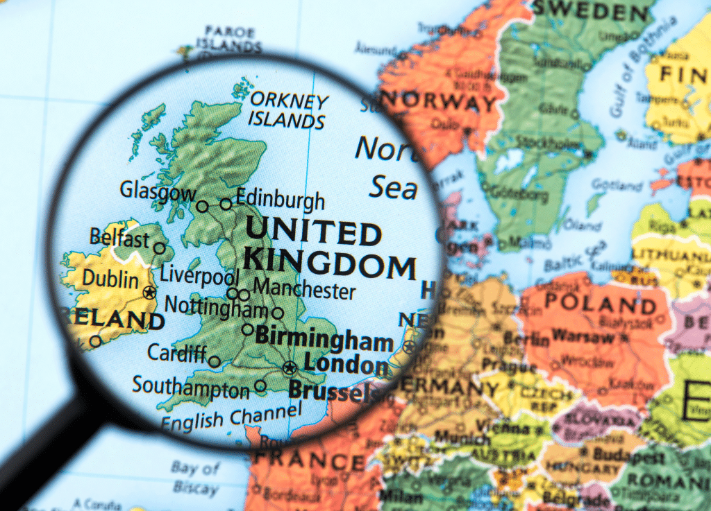 map with magnifying glass over the united kingdom