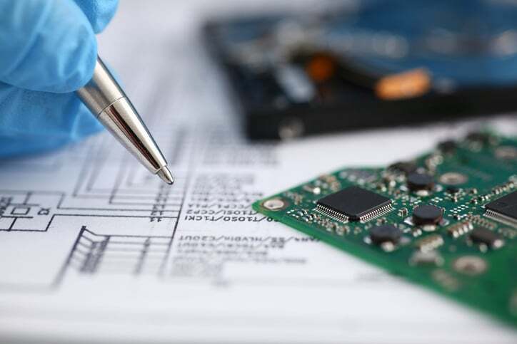 pen writing near microchip